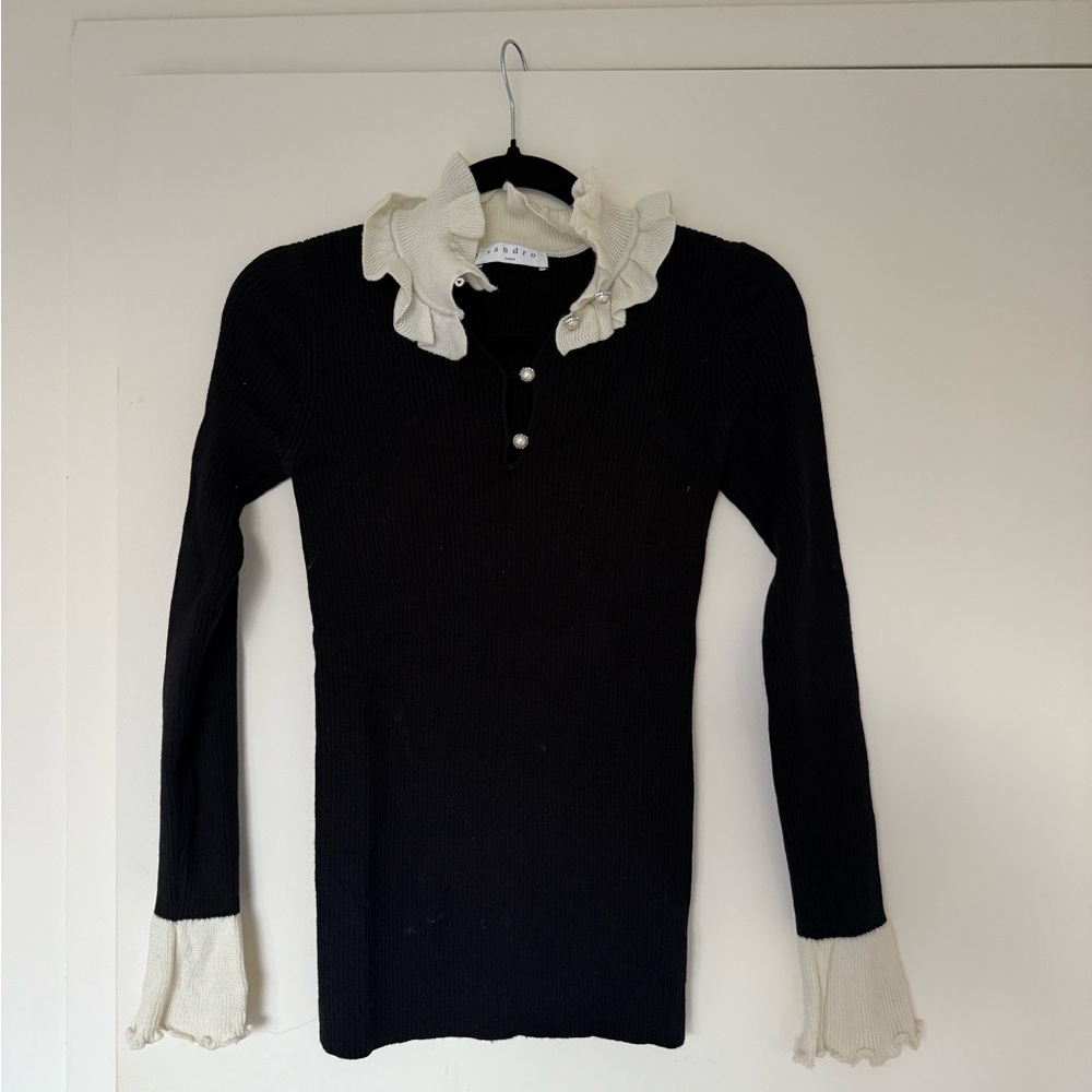 Sandro Black Top with Cream Ruffle Accents